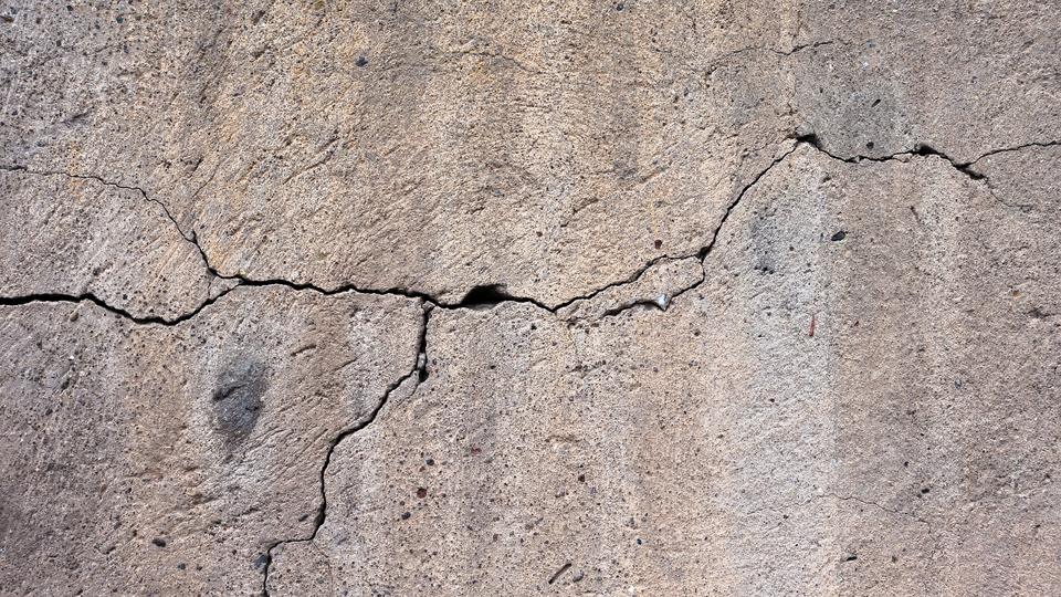 Weathered concrete surface in need of repair