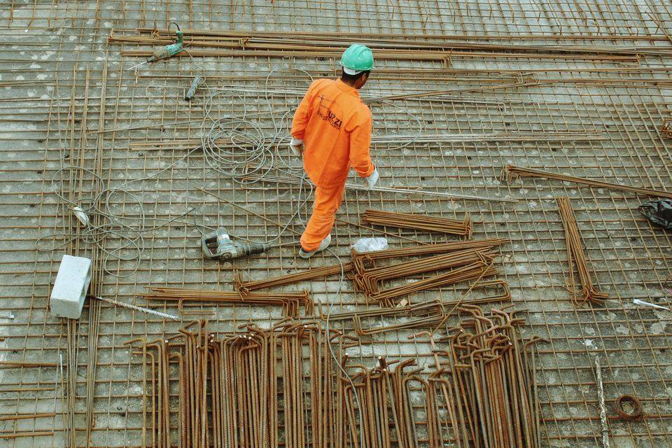 Worker on a deck with reinforcing steel in place